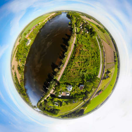 A three dimensional aerial panoramic view of river Kymijoki bank with beautiful wooden Rabbelugn...