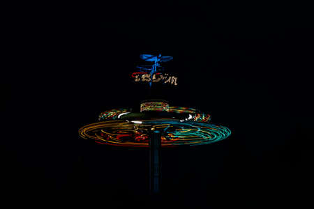 Kouvola, Finland - 28 August 2021: Rotating ride Taifun in amusement park Tykkimaki at night