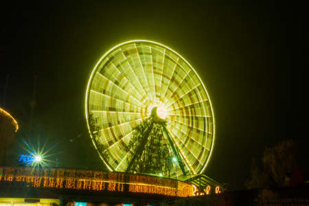 HELSINKI, FINLAND -OCTOBER 12, 2018: The Carnival of Light event at the Linnanmaki amusement park in Helsinki, Finland. Ride Ferris Wheel Rinkeli.のeditorial素材