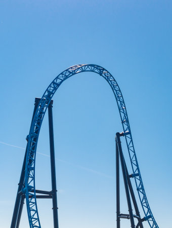 Empty ride roller coaster on sky background in amusement parkの写真素材