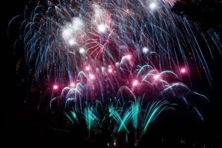 Colorful fireworks lights on the night sky backgroundの写真素材