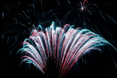 Colorful fireworks lights on the night sky background