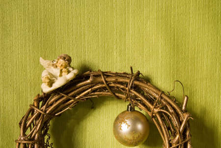 Christmas decoration with angels on the green backgrondの写真素材