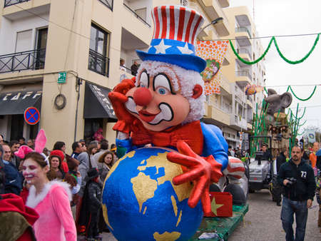 LOULE, PORTUGAL - FEBRUARY 16: Parade participants dance during the Carnival Loule Parade February 16, 2010 in Loule, Portugal.のeditorial素材