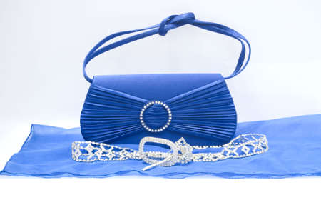 The  elegance blue women clutch bag isolated on white backgroundの写真素材
