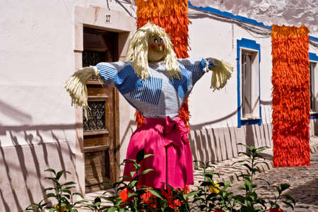 REDONDO, PORTUGAL -10 AUGUST 2013. Festival flower  in streets in Alentejo- Ruas floridas-Made paper´s dolls on 10 August 2013 Redondo, Portugalのeditorial素材