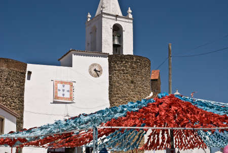 REDONDO, PORTUGAL -10 AUGUST 2013. Festival flower  in streets in Alentejo- Ruas floridas-Made paper´s dolls on 10 August 2013 Redondo, Portugalのeditorial素材