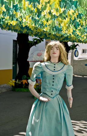 REDONDO, PORTUGAL -10 AUGUST 2013. Festival flower  in streets in Alentejo- Ruas floridas-Made paper´s dolls on 10 August 2013 Redondo, Portugalのeditorial素材