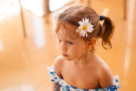 Portrait of beautiful blond little girlの写真素材