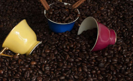cup of coffee with coffee beans.
