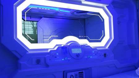 Sleepbox with neon lights, space capsule for sleeping at the airport, inside viewの写真素材