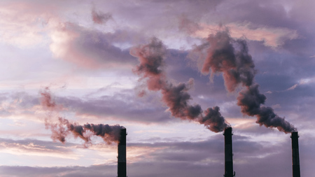 Smoke from large industrial pipes at dawn, environmental pollution. Time-lapse.の写真素材