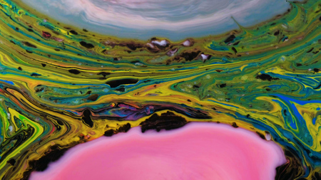 Multicolored psychedelic patterns of paint, colored liquid tapersの写真素材