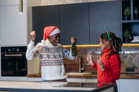 African American man and white woman celebrate Christmasの写真素材