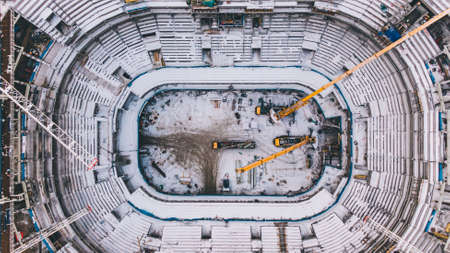 Construction of a large sports stadium, aerial viewの写真素材