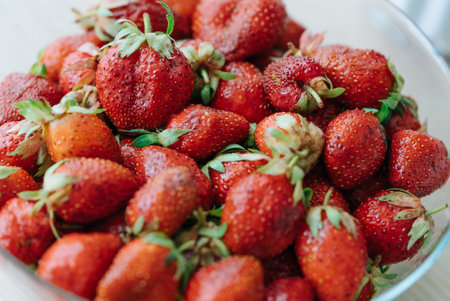 Freshly Picked Ripe Strawberries in a Bowlの写真素材