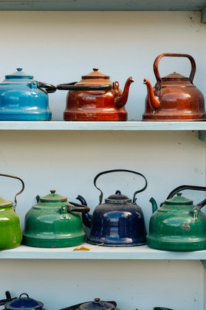 Colorful Vintage Teapots on Display Shelf
