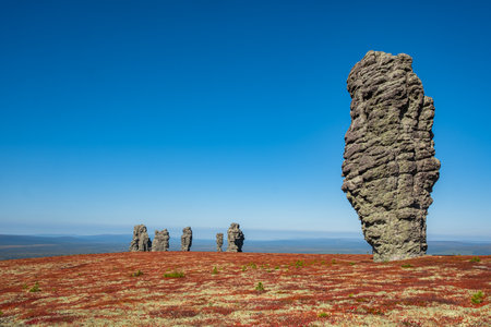 Uncover the stunning manpupuner pillars in the komi republic of russia, towering in the ural mountainsの写真素材