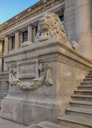 Lion statue outside Vancouver Art Gallery beside steps in downtown in Vancouver, BC / Canada-November 1,2020. Selective focus, street view, travel photo, mobile photo.のeditorial素材