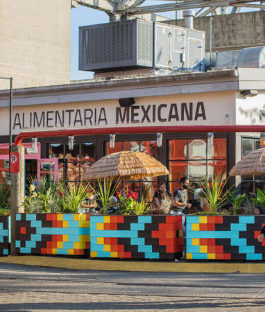 Street view of a front side of the Alimentaria Mexicana restaurant in Vancouver BC Canada in Granville Island-July 29,2021. Travel photo, selective focus, nobodyのeditorial素材