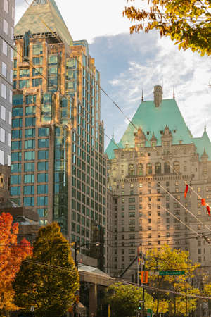 Sunset seen in huge buildings and beautiful skyscrapers in downtown of Vancouver BC, Canada. Close Up Of Modern Office Buildings. Street view, travel photo, nobody, abstractのeditorial素材
