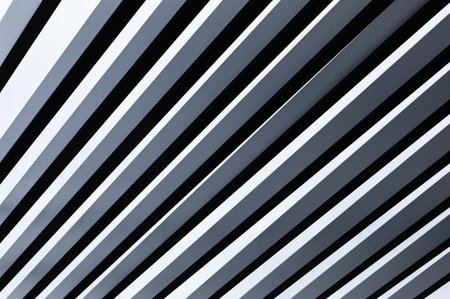 Abstract lines in black and whit. Light and shadow lines. Black and white photoof architectural lines, diagonal, mockup. Nobody, selective focus.の写真素材