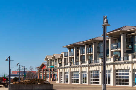 Brand new apartment building on sunny day in BC, Canada. Canadian modern residential architecture....