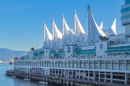 Canada Place and commercial buildings in Downtown Vancouver BC, Canada-November 11,2020. Street view, travel photo, selective focusのeditorial素材