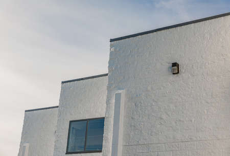 Abstract architecture against morning sky. Modern white building against a morning sky