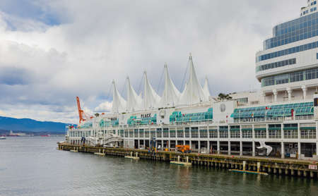Canada Place Harbor in Vancouver, Canada. Famous Vancouver main cruise ship terminal, it was built in 1927-April 11,2022. travel photography, selective focus, editorialのeditorial素材