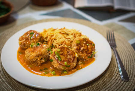 Meat balls with tomato sauce. Plate of meatballs with sauce and pasta. Healthy cooking concept, selective focus, nobody, copy space for textの写真素材