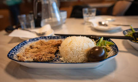 Asian food in a plate with rice. Various of Asian meals at the restaurant , top view , place for text. Asian food concept. nobody.の写真素材