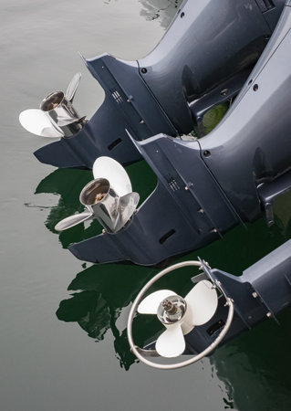Close up of a Ship Propellers in water. A boat propellers at the marina. motorboat propellers....