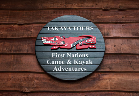 Canoe and Kayak Rental sign. Adventures sign welcomes tourists, offers guided Takaya tours, kayaks and canoes for rentals for tourists. Information wooden sign-Vancouver BC Canada-November 21,2022のeditorial素材