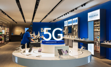 Mobile phone, smartphone with 5 G wireless high speed internet shop. Creative big letters 5G.Modern...