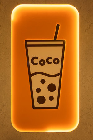 Close up of CoCo Fresh Tea and Juice store sign. Popular Taiwanese tapioca drink shop CoCo in Vancouver BC Canada. Shop is famous for Taiwanese tapioca milk tea-December 8.2022. Nobodyのeditorial素材