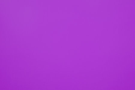 Violet background. Empty pinkish purple color pattern on a wall. Paint wall background. Nobody, sopy space for textの写真素材