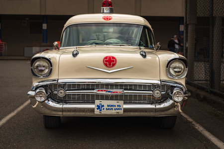 Vintage Classic car 1957 Chevy Ambulance Station wagon, Ambulance Service parked on a street. Old Ambulance car Chevrolet. Street photo, nobody-Vancouver Canada-May 1,2023のeditorial素材