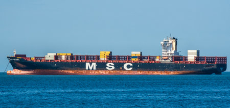 Big container ship MSC Meline is ancored at Vancouver Canada harbour. Containership MSC...