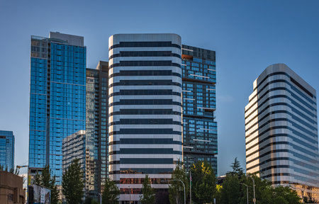 Seattle downtown skyline and skyscrapers beyond the I-5 I-90 freeway interchange at sunset. Modern City Skyscrapers, Seattle city architecture. Travel photo-August, 8,2024-WA, USAのeditorial素材