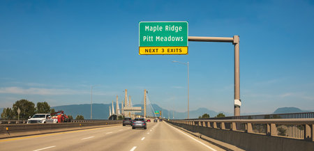 The Golden Ears Bridge, connecting Maple Ridge to Langley. Traffic on a cable-suspended bridge...