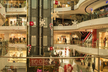 People Busy shopping for Christmas Holiday in a decorative Shopping Mall, Interior of a shopping...