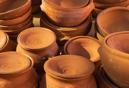 Handmade ceramic new empty craft ceramic plates, bowls and lids. Pottery Craft Ceramic Clay Pottery made by Human Hand.の写真素材