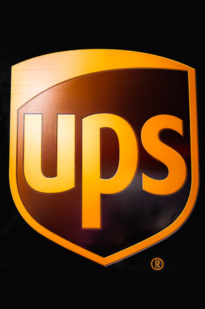 United parcel service UPS delivery and shipping mail for business worldwide for commercial trade. UPS logo for background. American multinational package delivery company-Oct 14,2022-Vancouver Canadaのeditorial素材