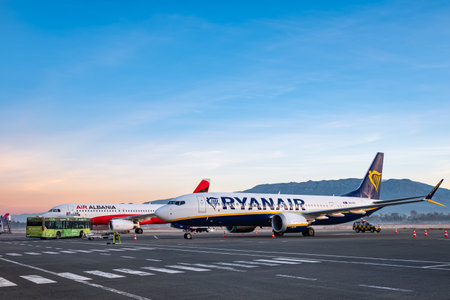 Rayanair aircraft before boarding at Tirana Albania airport. Low-cost plane Rayanair stands at the airport. Plane near the terminal boarding the low cost airline Rayanair-December 8,2023のeditorial素材