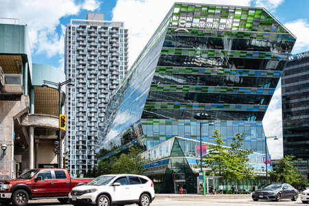 Coast Capital Savings Bank in Surrey Vancouver Canada. Largest credit union in Canada with 535,000 members. Modern architecture buildings in downtown King George Surrey BC-July 26,2023-Editorialのeditorial素材