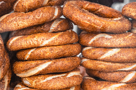 Traditional tasty Turkish bread semit withe sesame seeds sold everywhere across Turkey and popular for breakfast. Turkish breakfast National food semite bun. Turkish Bagel Simit with sesame seedsの写真素材