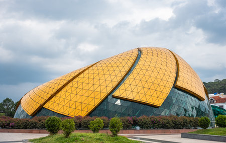 Giant sunflower building at Lam Vien square park. Glass Pavilion in the form of a flower sunflower Lam Vien Square Vietnam. Da Lat is a popular touristic destination Travel photo-April 17,2024のeditorial素材