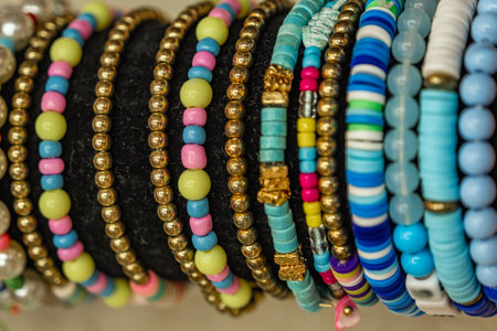 Handmade colorful beads bracelets, bangles. Colorful Beads Background. Background pattern of...