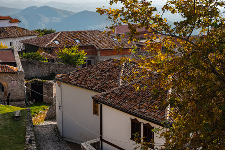 Traditional clay tile roofs, Albania. Historic town with traditional stone houses. Red tiled roofs of the houses in Old town of Kruje. Traditional Ottoman stone housesの写真素材